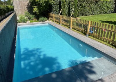 Création piscine PVC armé avec plage immergée et volet solaire