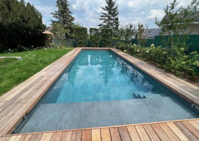 Piscine carrelage Genève terrasse bois