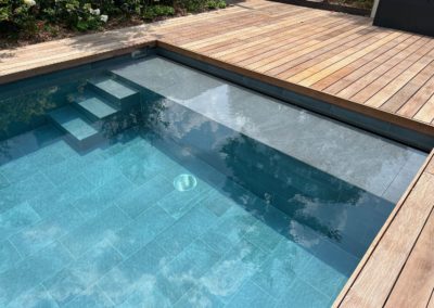 Piscine carrelage Genève terrasse bois