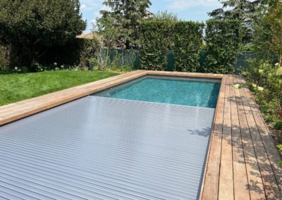 Piscine carrelage Genève terrasse bois